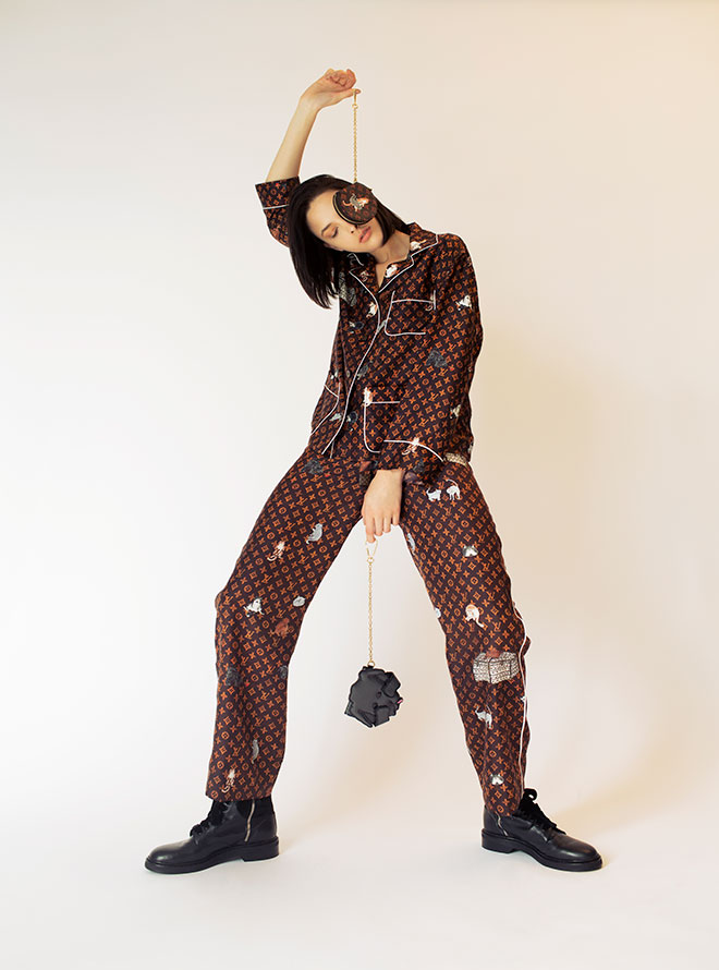 Grace Coddington pajama Shirt $15,800, pajarma pants $14,500,  Catogram micro boite chapeau $6,050, dog card holder $7,150 from Louis Vuitton Boots $16,500 from Roger Vivier