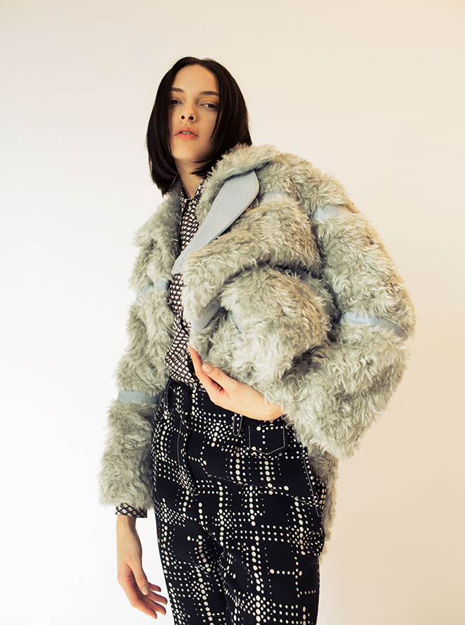 Silk skirt $8,500, mohair fur/wool coat $24,000, wool shorts $6,800 from Bottega Veneta