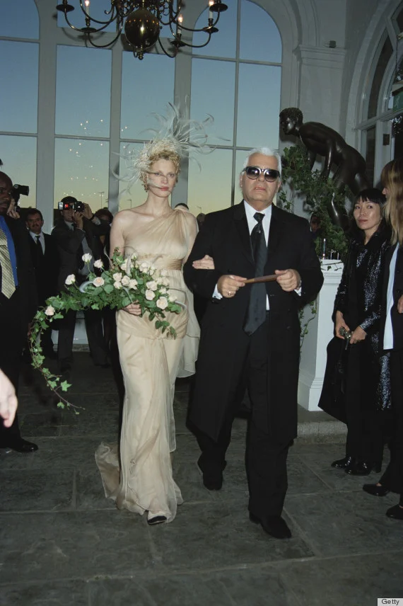 Fashion designer Karl Lagerfeld gives away supermodel Kristen McMenamy at her wedding to photographer Miles Aldridge in Kensington, 21st October 1997. (Photo by Dave Benett/Getty Images)