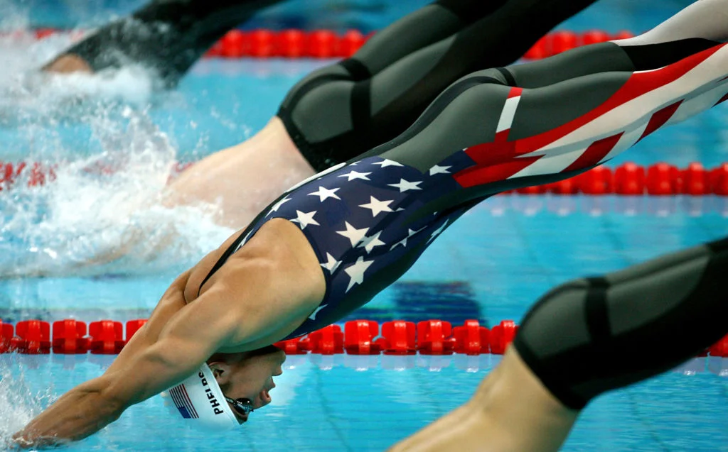 BEIJING - AUGUST 10: Michael Phelps of the United States competes in the Men's 200m Freestyle Heat 8 event held at the National Aquatics Center during day 2 of the Beijing 2008 Olympic Games on August 10, 2008 in Beijing, China. (Photo by Adam Pretty/Getty Images) (Photo by Adam Pretty / Getty Images AsiaPac / Getty Images via AFP)